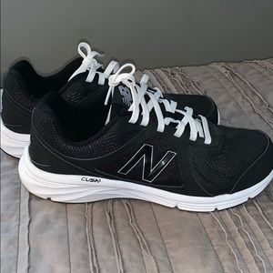 Women’s size 11 New Balance Tennis Shoes